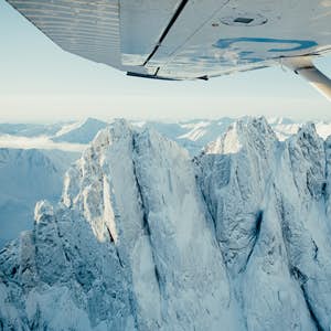 Plane over Tombstone Mountains
