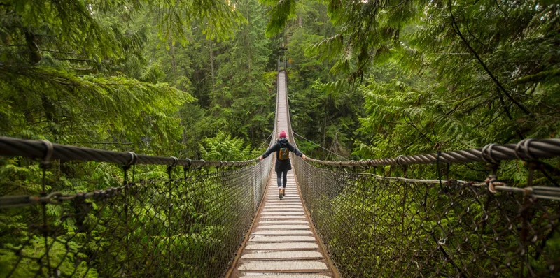 Woman walking on a bridge in Canada.