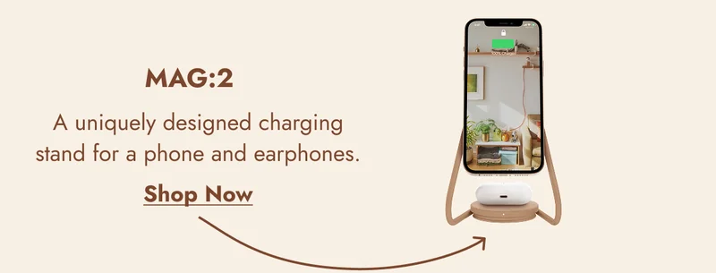 MAG:2 A uniquely designed charging stand for a phone and earphones. Shop Now