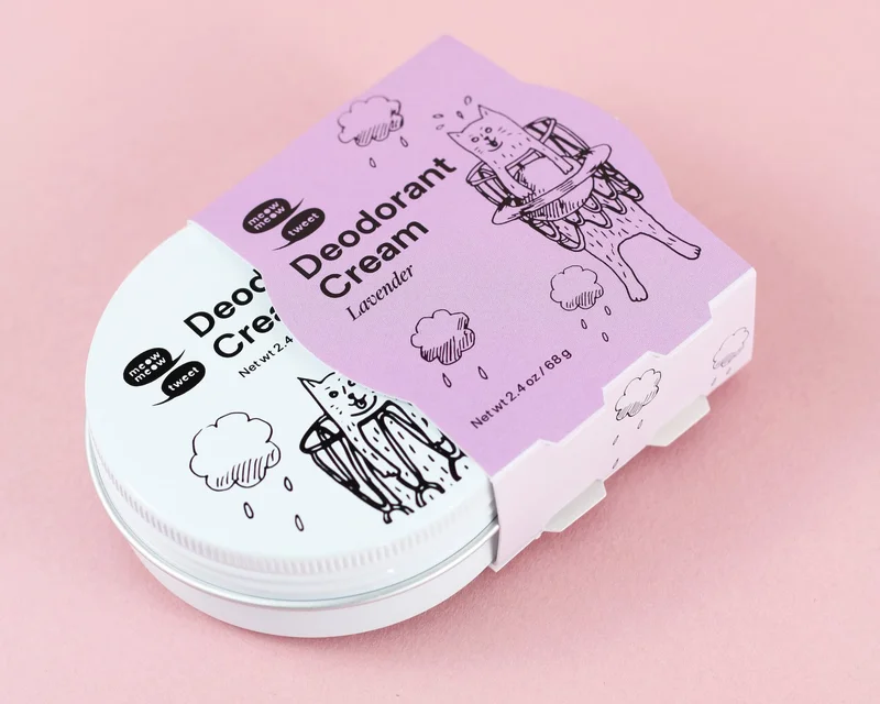 A WHITE TIN IN A PURPLE SLEEVE ON A PINK BACKGROUND