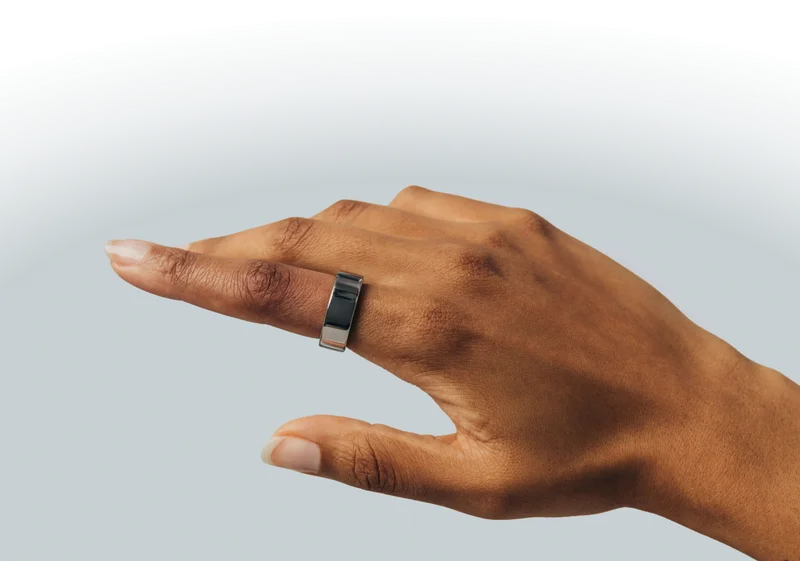 Hand wearing Oura Ring 4 Silver