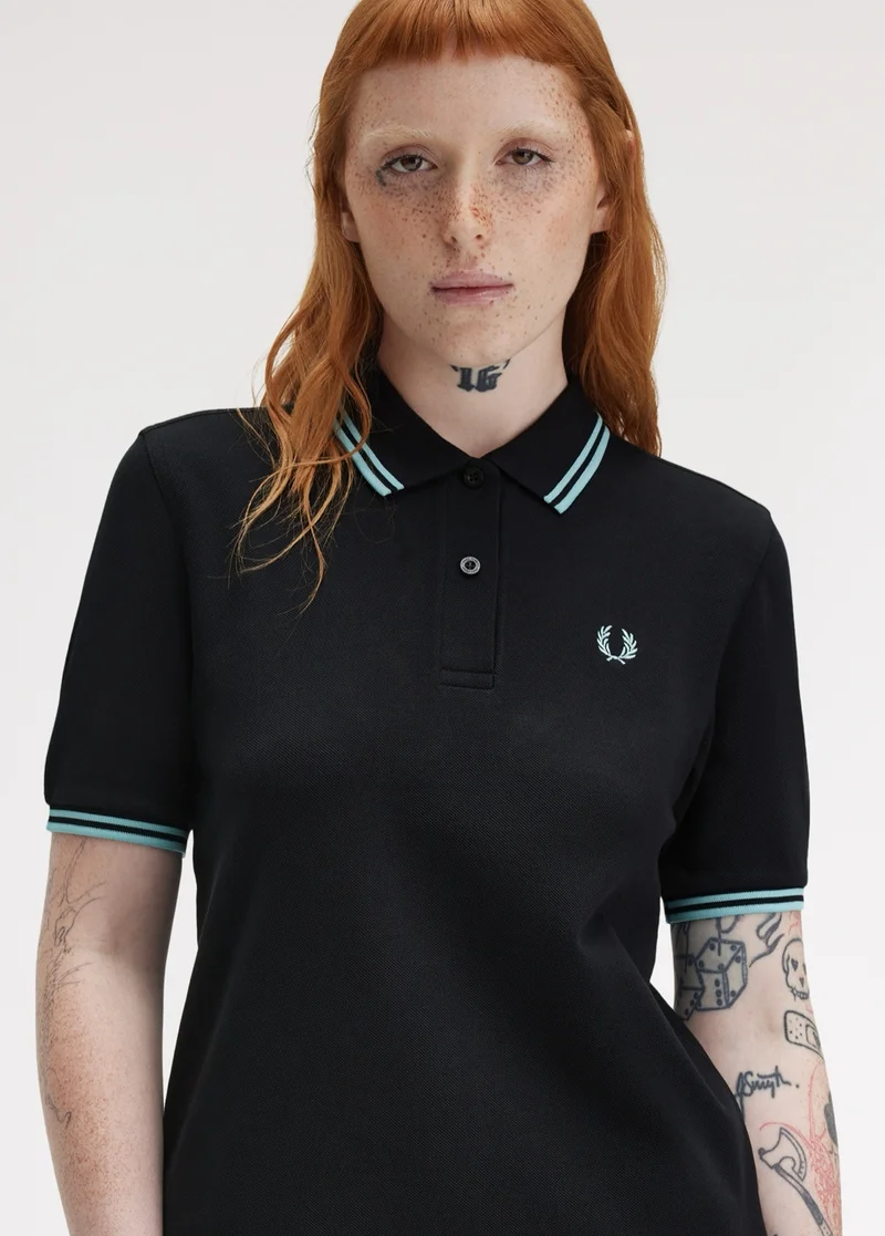 Woman wearing the women's Fred Perry Shirt