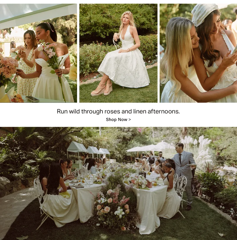 Women in elegant white and floral summer dresses enjoying a lush garden party. Perfect for bridal parties or special occasion events. Shop now.