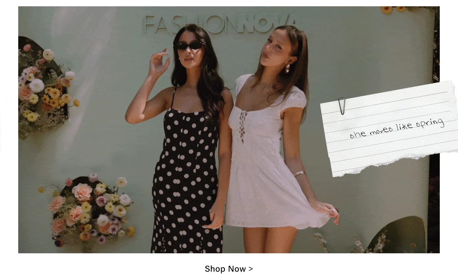 Two women showcase Fashion Nova spring collection: black polka dot midi dress, white lace-up mini dress. Perfect for new season fashion.