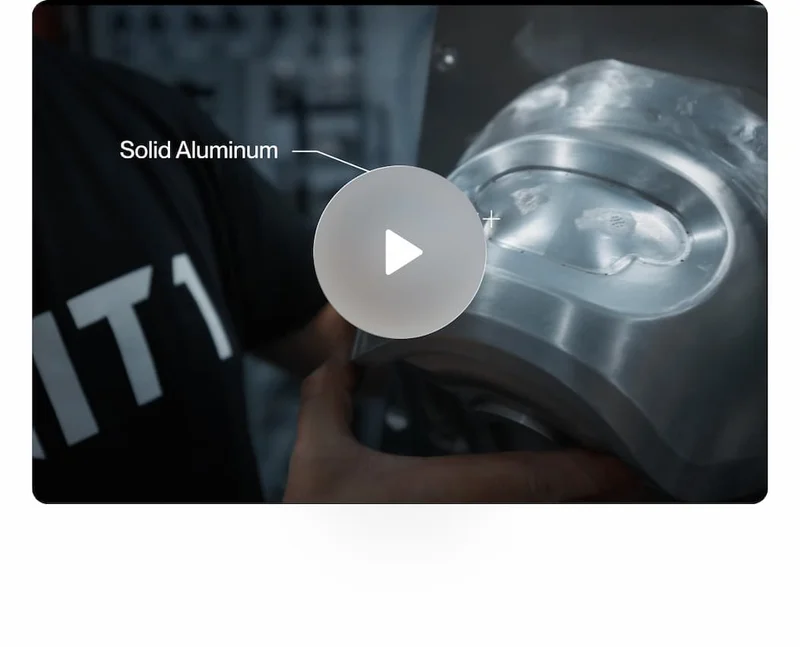 Close up of solid aluminum helmet mold being machined inside the UNIT 1 factory, shown as a video preview.