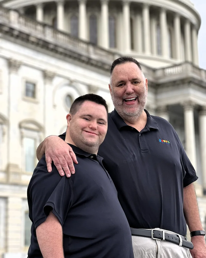 John and Mark standing on the steps of the U.S. Capitol