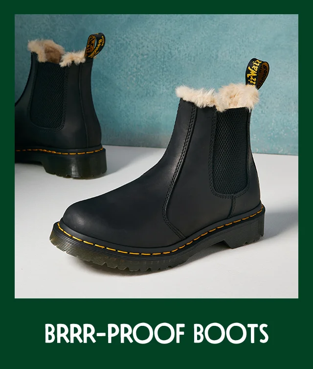 Dr. Martens boots with plush lining.