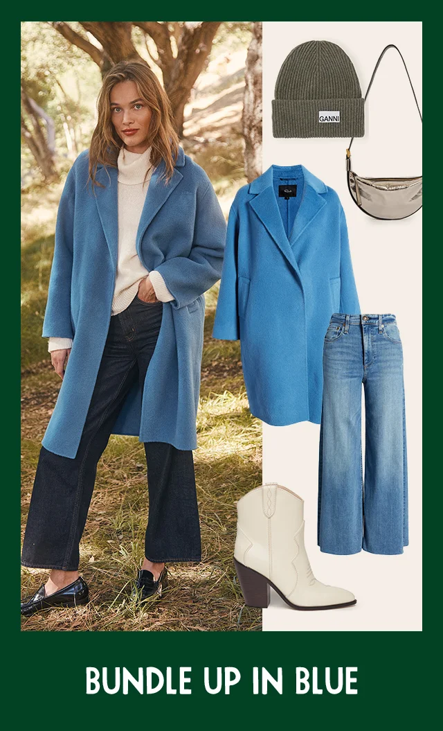 A woman wearing a blue coat and jeans.  A beanie, handbag and white bootie to complete the look.