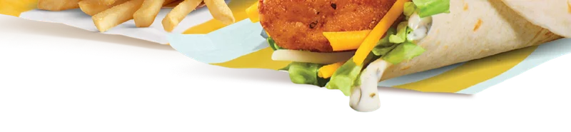 A Snack Wrap meal comes with medium fries and drink, like a Lemonade. Lemonade is subject to an additional charge.