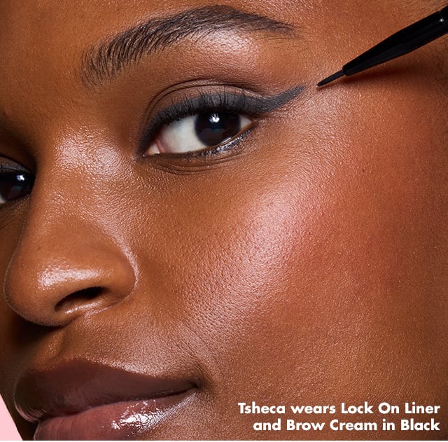 Model applying Lock On Liner and Brow Cream with Ultra-fine eyeliner brush