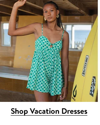 A woman wearing a printed Billabong minidress.