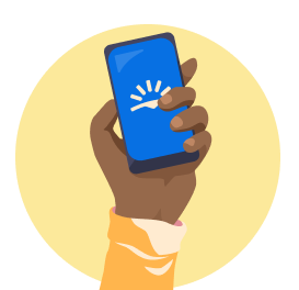 Hand holding a cell phone showing Skyscanner logo