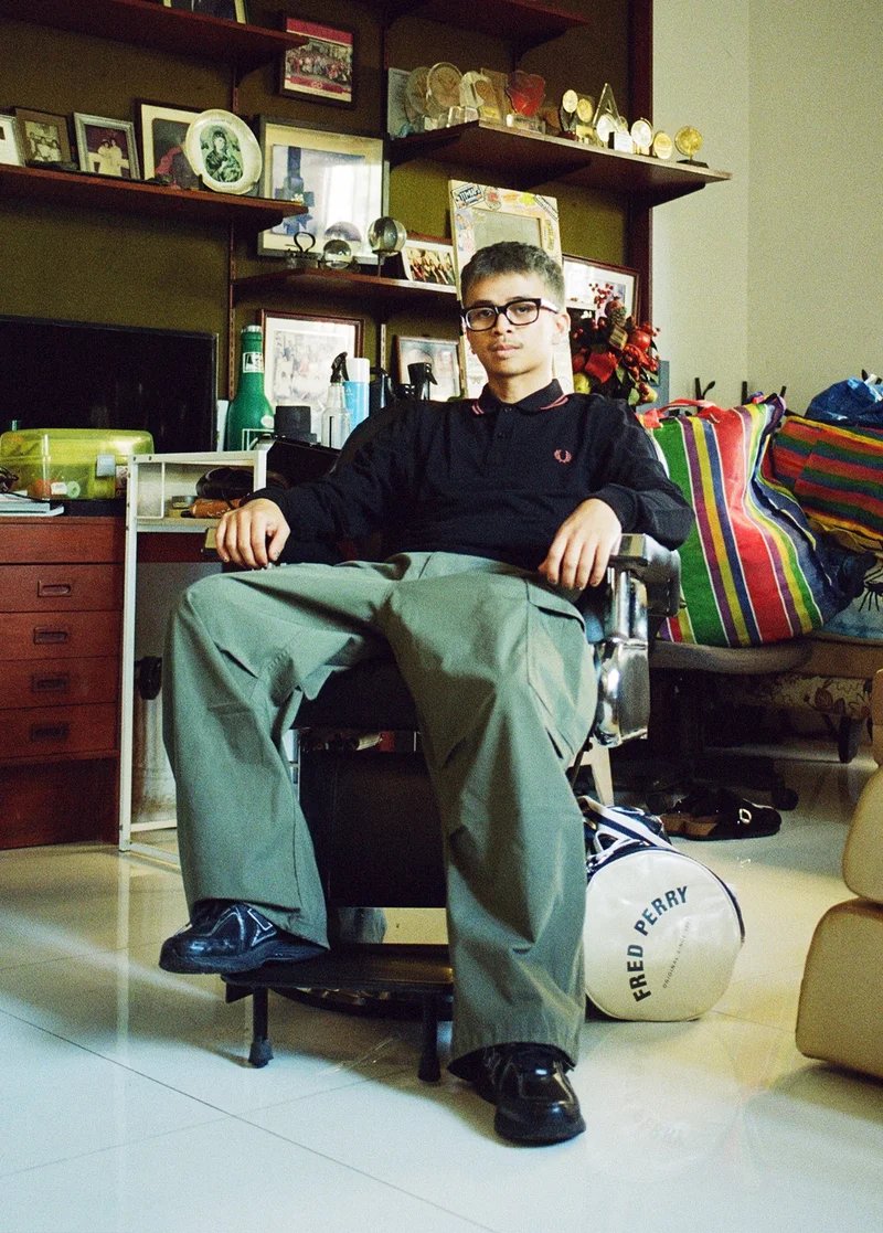 Man reclined wearing long sleeve FPS