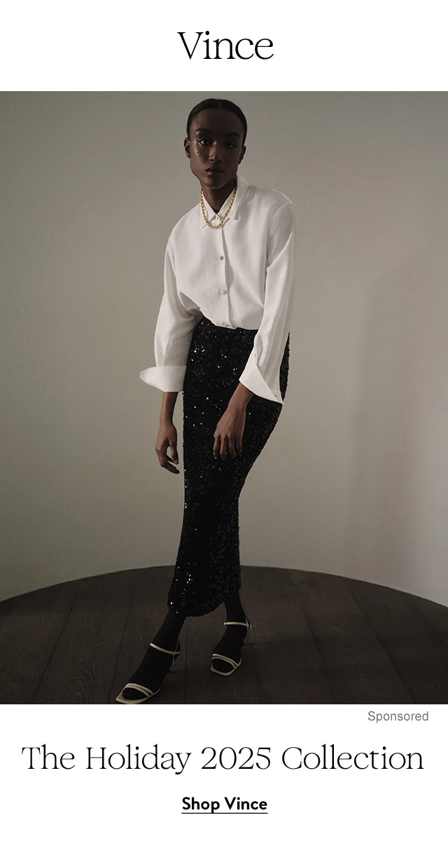 A woman wearing a white dress shirt with a long sequined black skirt.