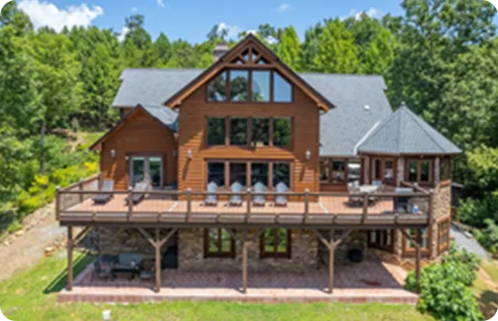 Enjoy front porch mornings and lake-view afternoons at a spacious private cabin in Lake Lure, North Carolina.