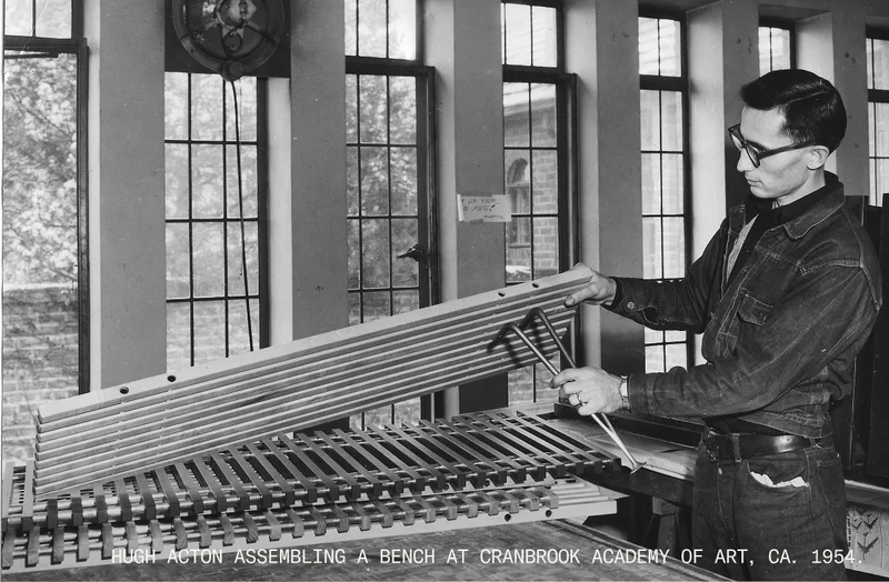 Hugh Acton assembling a bench at Cranbrook Academy of Art, circa 1954.