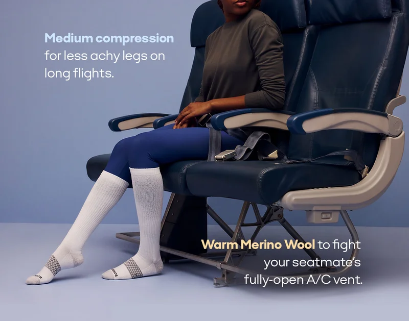 Medium compression for less achy legs on long flights. Warm Merino Wool to fight you seatmate's fully-open A/C vent.