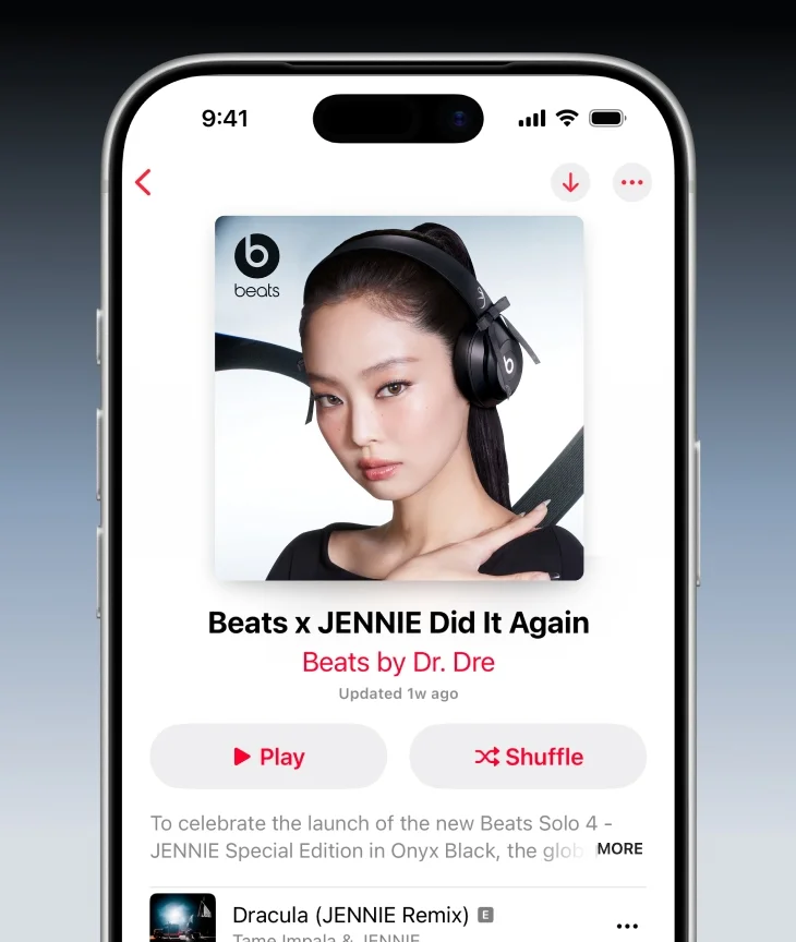 An iPhone displays an Apple Music app screen featuring Jennie Kim's music playlist