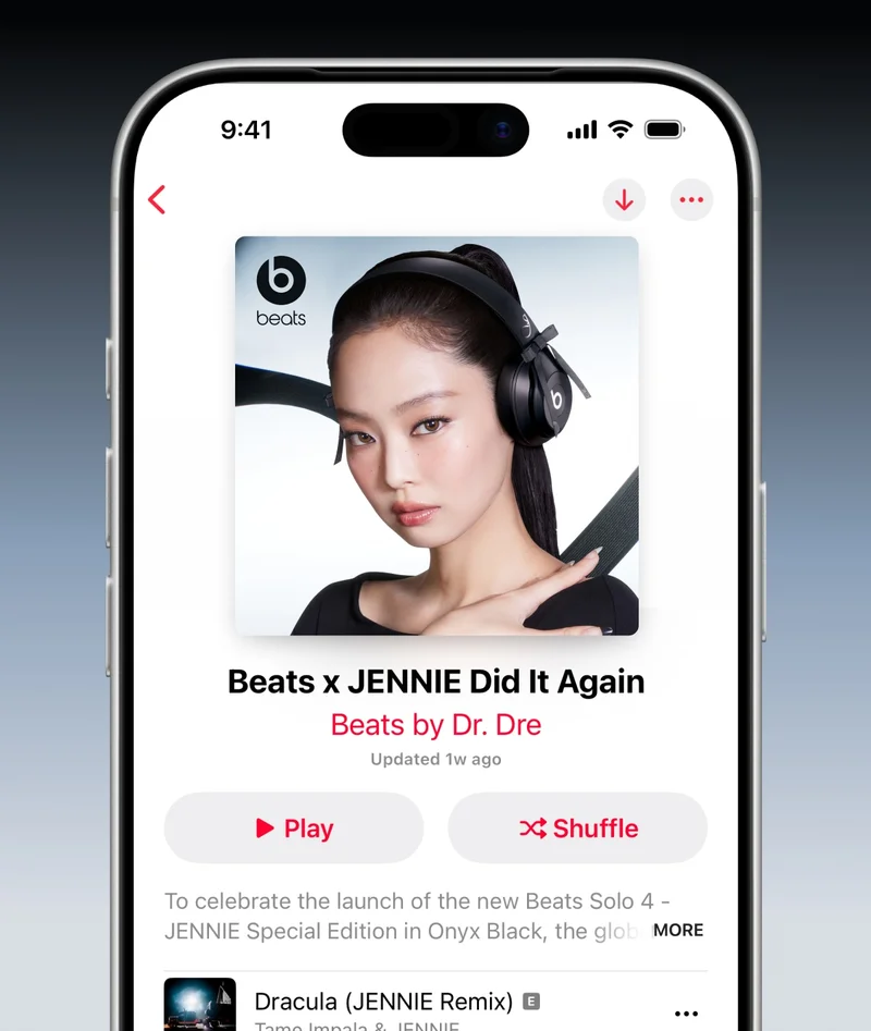 An iPhone displays an Apple Music app screen featuring Jennie Kim's music playlist