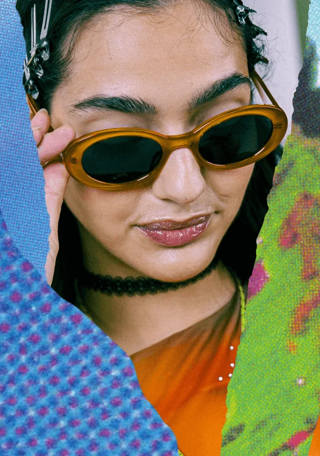 Woman in 90s attire looks away from the camera.