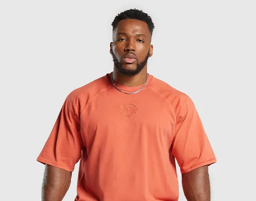 PREMIUM LEGACY T-SHIRT - MUTED ORANGE.