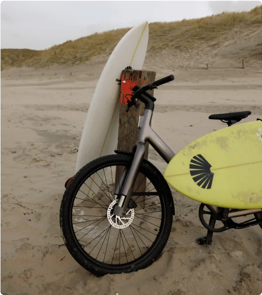 A photograph of a Cross ST carrying a surfboard
