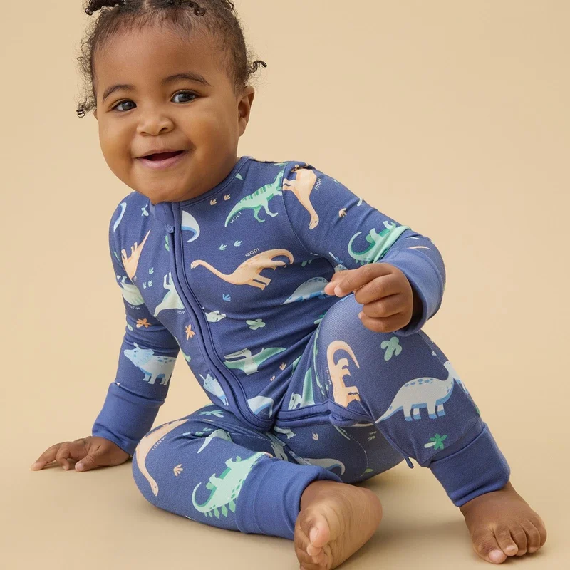 Image of Dinosaur Nights Clever Zip Baby Pajamas - Blue