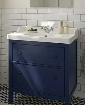 Blue HEMNES bathroom vanity with RUTSJÖN sink.