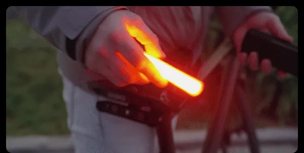 A man charging its lights with a charging case.