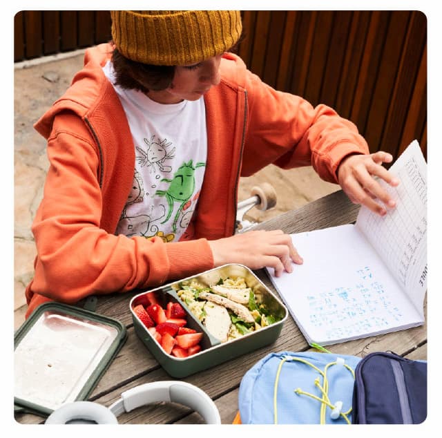 Student with Lunch Box