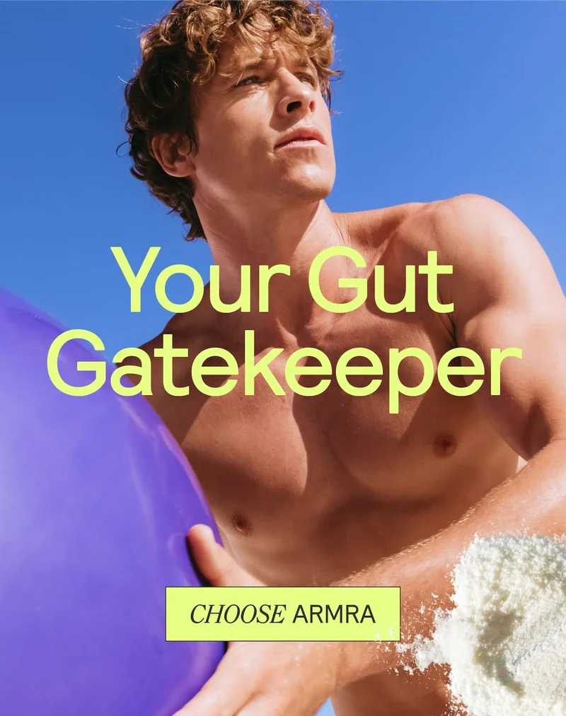 Hero image of a shirtless man holding a purple surfboard under a bright blue sky with large text ‘Your Gut Gatekeeper’ and a ‘Choose ARMRA’ button.”