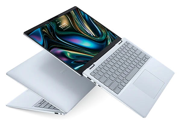 Two Dell 14 Plus Laptops on a gray background.
