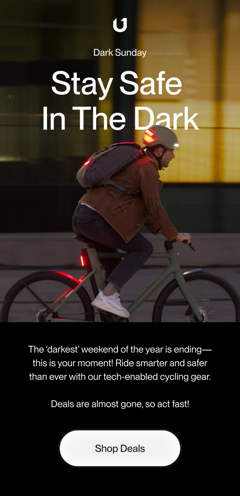 Man riding safely in the dark with his smart cycling gear.
