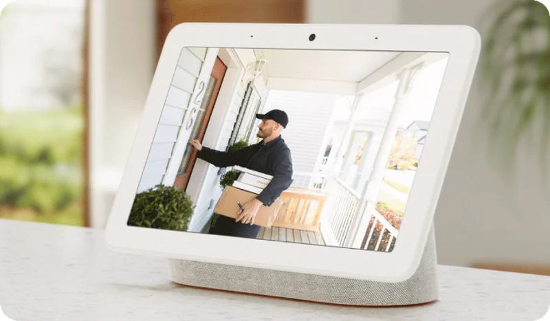 Tablet showing a simulated Arlo screen image of a live camera stream.