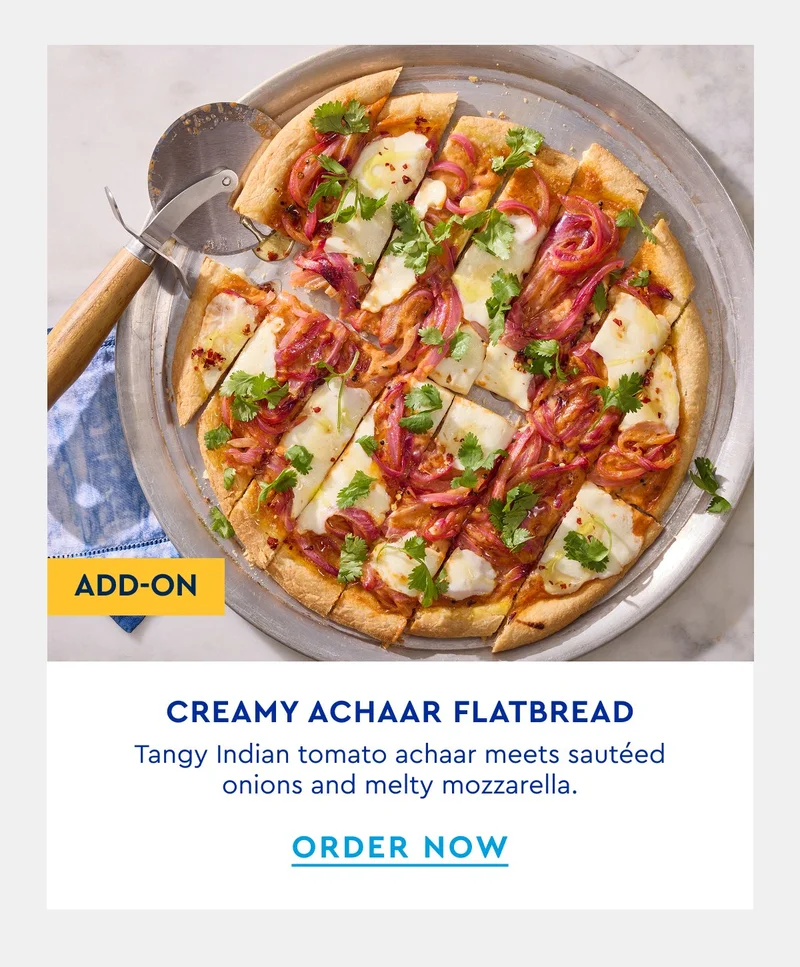 Creamy Achaar Flatbread | Tangy Indian tomato achaar meets sauteed onions and melty mozzarella. | ORDER NOW
