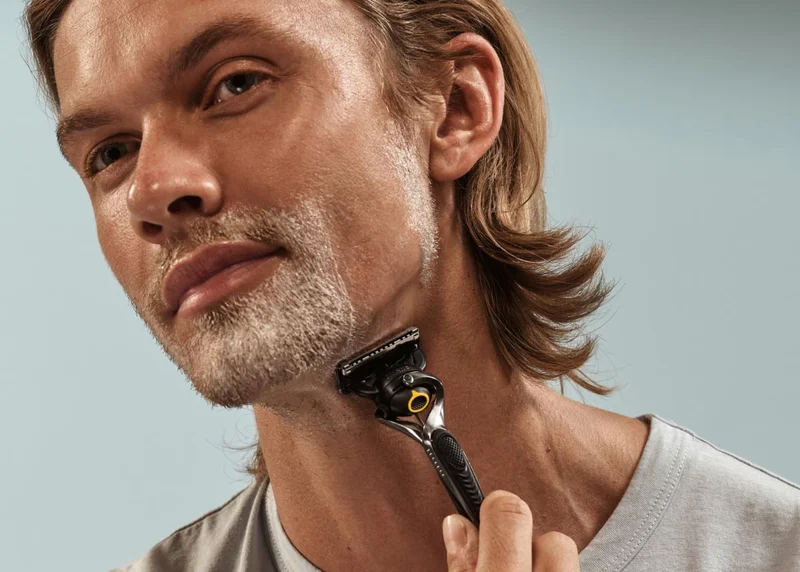 Man shaving with Gillette razor