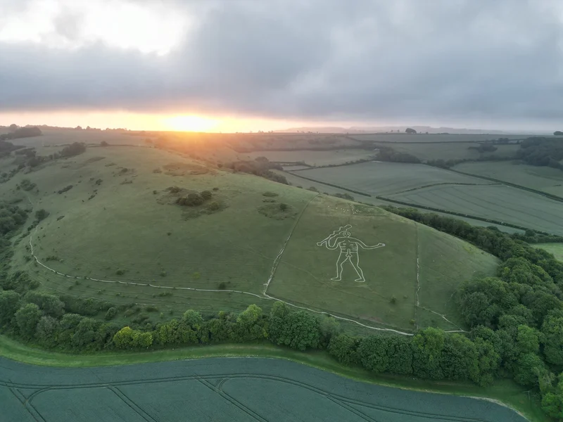 The Cerne Giant, otherwise know, as the 'Rude Man of Cerne,' is an 18-story-high chalk drawing on an English hillside.