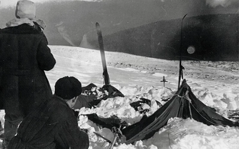 Soviet investigators examine the tent belonging to the Dyatlov Pass expedition on February 26, 1959. The tent had been cut open from inside, and many team members had fled in socks or bare feet.