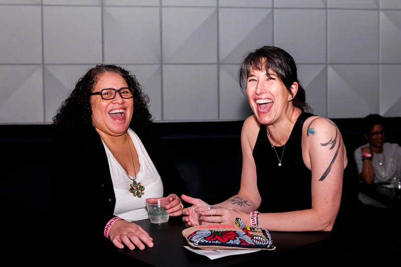 Two women laughing