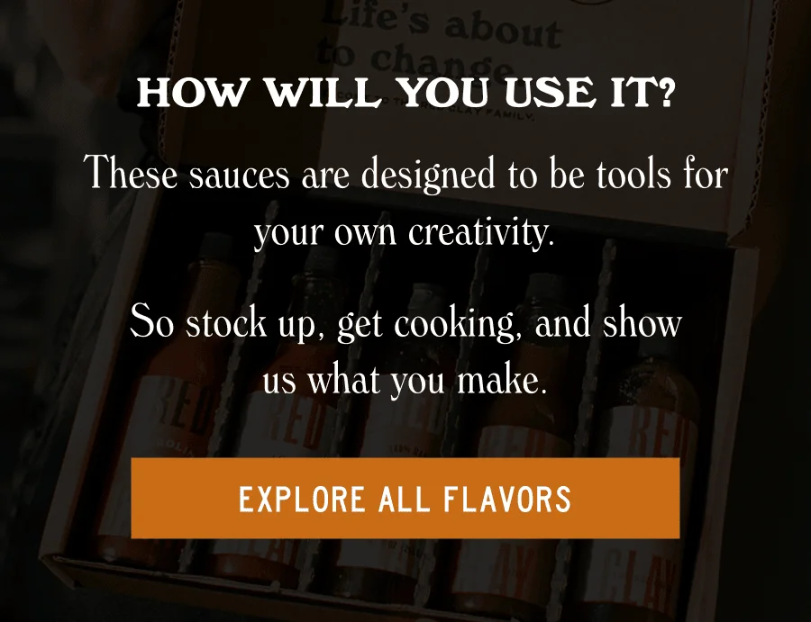 an image of a bottle of hot sauce with oranges on it