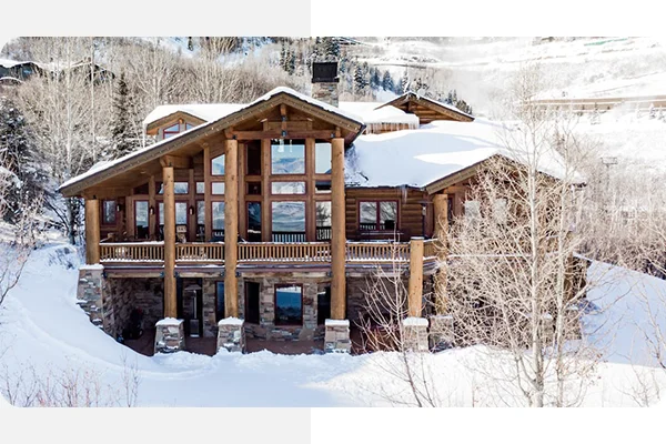 Reunite with friends in a relaxing space with floor-to-ceiling windows in Park City, Utah.