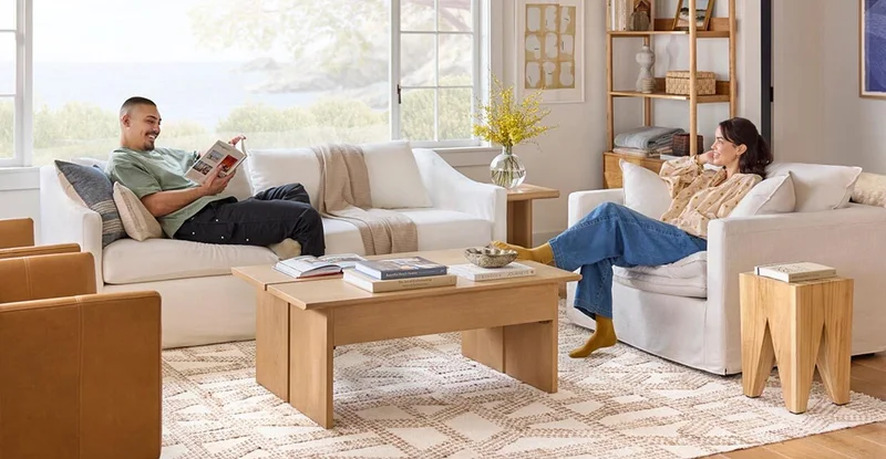 Bring the carefree feeling of the sunny season into your space with easy-to-clean slipcover sofas, and natural oak tones.