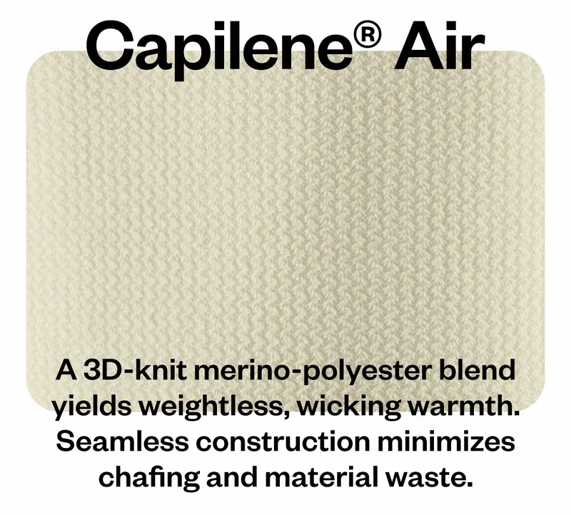 Capilene Air. Magnified image of fabric with wavy ridges. A 3D-knit merino-polyester blend yields weightless, wicking warmth. Seamless construction minimizes chafing and material waste.