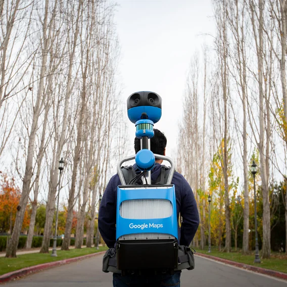 Man carrying a Street View trekker