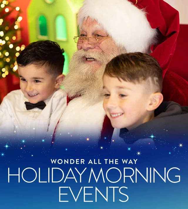 Wonder all the way: holiday morning events. Two kids smiling with Santa.
