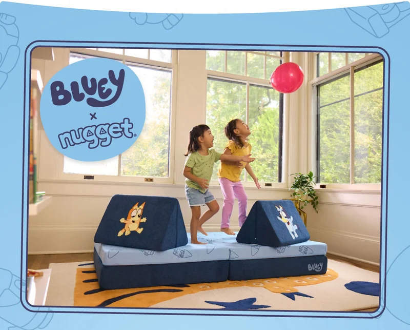 Two children play with a red balloon on the new Bluey Nugget.