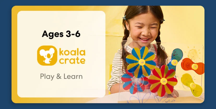 Young child smiling while working on creative KiwiCo Sprout projects, perfect for ages 3–6 for play and learn.