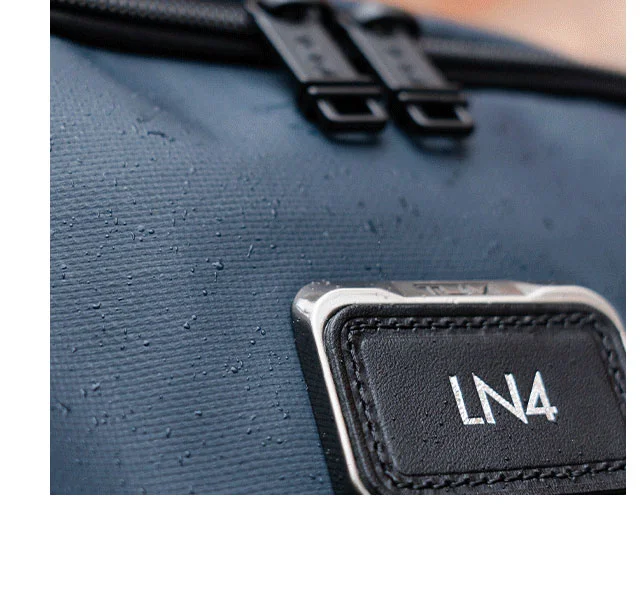Discover Alpha Bravo in this season's new Navy Coated Canvas