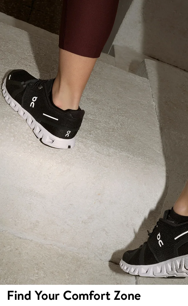 Woman wearing On sneakers.