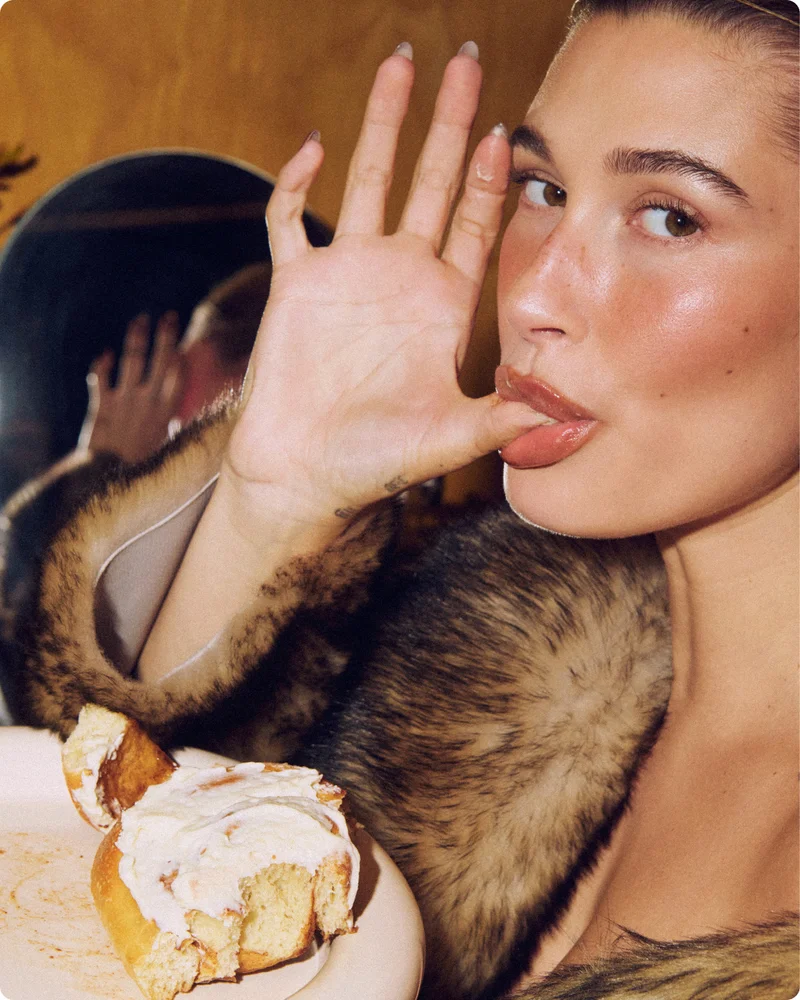 hailey bieber wears peptide lip tint in cinnamon roll + pocket blush in toasted teddy